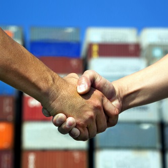 Japan-Australian-Free-Trade-Agreement_shaking-hands-infront-of-containers_BCR